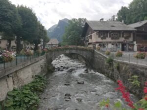 Old bridge over the Dranse in the Alpine village of Morzine