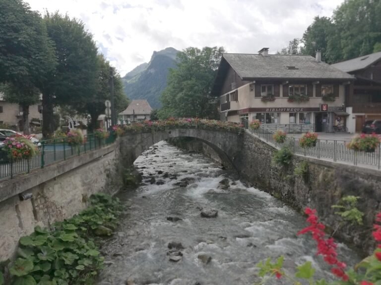 Old bridge over the Dranse in the Alpine village of Morzine