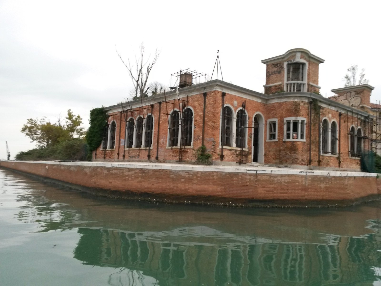 Abandoned hospital buildings on Poveglia Island in the Venetian Lagoon